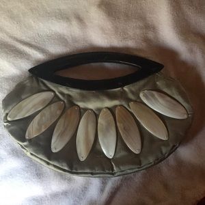 Half moon clutch